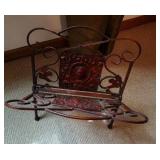 Ornate Wrought Iron Magazine Rack with Decorative Motif