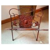 Ornate Wrought Iron Magazine Rack with Decorative Motif
