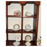 Set of 10 Vintage Decorative Porcelain Butter Chip Pat Plates with Floral Designs and Display Shelf