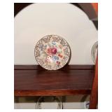 Set of 10 Vintage Decorative Porcelain Butter Chip Pat Plates with Floral Designs and Display Shelf