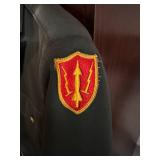 Vintage Military Uniform Jacket with Emblem and Gold Buttons