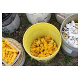 Collection of Electric Fence Supplies Including Wire, Insulators, and Energizer