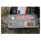 Collection of Electric Fence Supplies Including Wire, Insulators, and Energizer