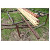 Collection of Steel Beams, Metal Scraps, and a Large Propane Tank