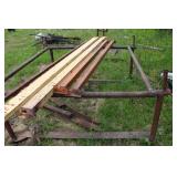 Collection of Steel Beams, Metal Scraps, and a Large Propane Tank