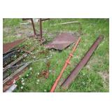 Collection of Steel Beams, Metal Scraps, and a Large Propane Tank