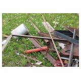 Collection of Steel Beams, Metal Scraps, and a Large Propane Tank