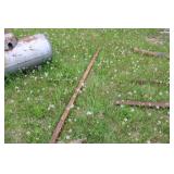 Collection of Steel Beams, Metal Scraps, and a Large Propane Tank