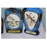 Collection of 7 Vintage Jim Beam Decanters with Various Designs