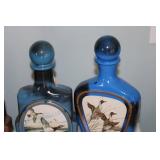 Collection of 7 Vintage Jim Beam Decanters with Various Designs