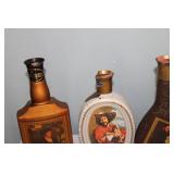 Collection of 7 Vintage Jim Beam Decanters with Various Designs