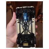 Collection of 3 Die-Cast Model Cars: 1968 Dodge Charger, Chevrolet, and Ford