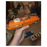 Set of 4 Diecast Model Cars Including Dodge Daytona, Convertible, Camaro, and Hooters Race Car