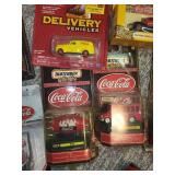 Collection of Coca-Cola Themed Matchbox Cars and Memorabilia