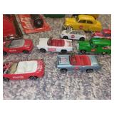 Collection of Coca-Cola Themed Matchbox Cars and Memorabilia