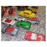 Collection of Coca-Cola Themed Matchbox Cars and Memorabilia