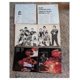 Collection of Vintage Vinyl Records with Iconic Albums