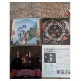 Collection of Vintage Vinyl Records with Iconic Albums