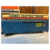 Lionel Train Set - Looney Tunes and IBP Boxcar with Caboose