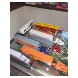 Collection of 18 Die-Cast Model Trucks with Trailers