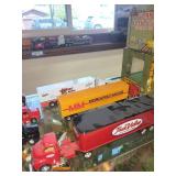 Collection of 18 Die-Cast Model Trucks with Trailers