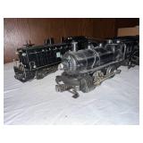Vintage Lionel Train Set including Engine, Tender, and Caboose