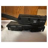 Vintage Lionel Train Set including Engine, Tender, and Caboose