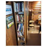 Collection of Historical and Train-Themed Books on Wooden Bookshelf