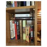 Collection of Historical and Train-Themed Books on Wooden Bookshelf