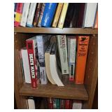 Collection of Historical and Train-Themed Books on Wooden Bookshelf