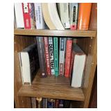 Collection of Historical and Train-Themed Books on Wooden Bookshelf