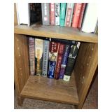 Collection of Historical and Train-Themed Books on Wooden Bookshelf
