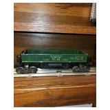 Set of Vintage Lionel Train Cars Including Auto-Loader, Tanker, and Dump Car