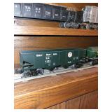 Set of Vintage Lionel Train Cars Including Auto-Loader, Tanker, and Dump Car