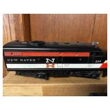 Vintage Lionel O-Gauge Electric Model Train Set with New Haven Locomotive and Cars