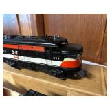 Vintage Lionel O-Gauge Electric Model Train Set with New Haven Locomotive and Cars