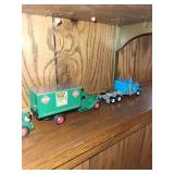 Collection of 6 Vintage Railway and Delivery Toy Trucks with Protective Cases