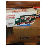 Collection of Lionel and Corgi Model Trucks with Original Packaging