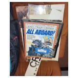 Collection of Train-Themed Books, Posters, and Art Prints