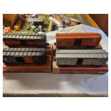 Collection of 4 Vintage Lionel Box Cars with Original Boxes