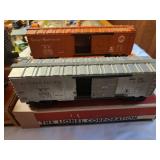 Collection of 4 Vintage Lionel Box Cars with Original Boxes