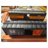 Collection of 4 Vintage Lionel Box Cars with Original Boxes