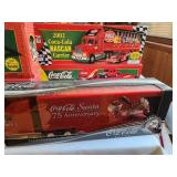 Collection of Coca-Cola Holiday Edition Die-Cast Trucks and NASCAR Carrier