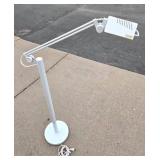 Nice Looking NADAIR Articulating Arm Floor Lamp