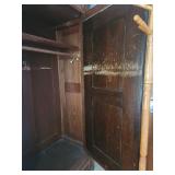 Antique Wooden Armoire with Intricate Carvings and Mirror