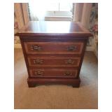 Vintage Wooden Three-Drawer Nightstand with Brass Handles
