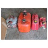 Set of 4 Used Gasoline Fuel Cans in Various Sizes