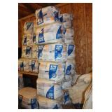 Set of Stacked R25 Fiberglass Insulation Bags from Johns Manville