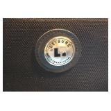 American Tourister Brown Garment Bag and Leisure International Black Upright Suitcase