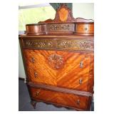 Antique Mahogany Dresser with Intricate Carvings and Brass Handles